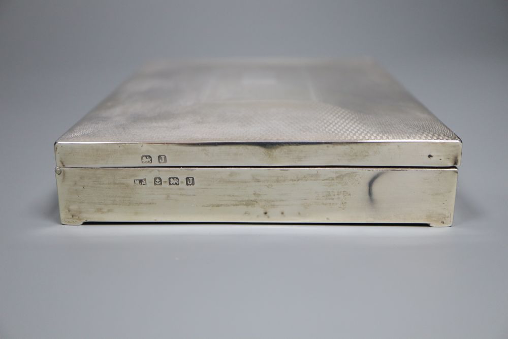 A George V part engine turned silver mounted rectangular cigarette box, William Adams Ltd, Birmingham, 1933, 16.1cm,